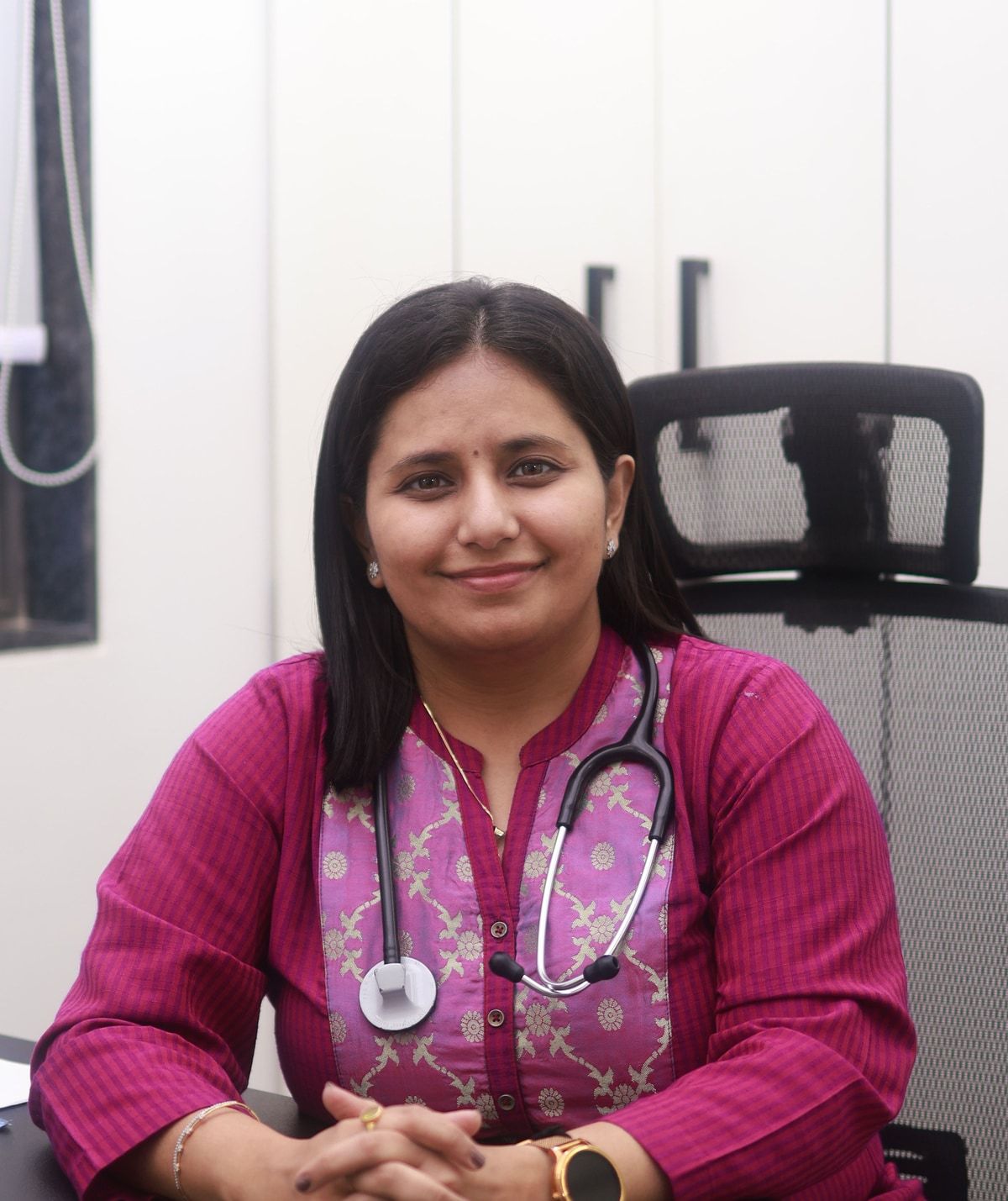 Dr. Divya Krishnani, MBBS, MD (Medicine), at her clinic in Surat